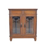 Small Edwardian oak cabinet, leaded and glazed doors, width 60cm, depth 26cm, height 70cm.