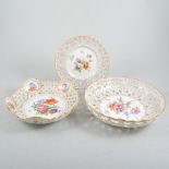 Quantity of Dresden porcelain handpainted tea wares, pierced borders,