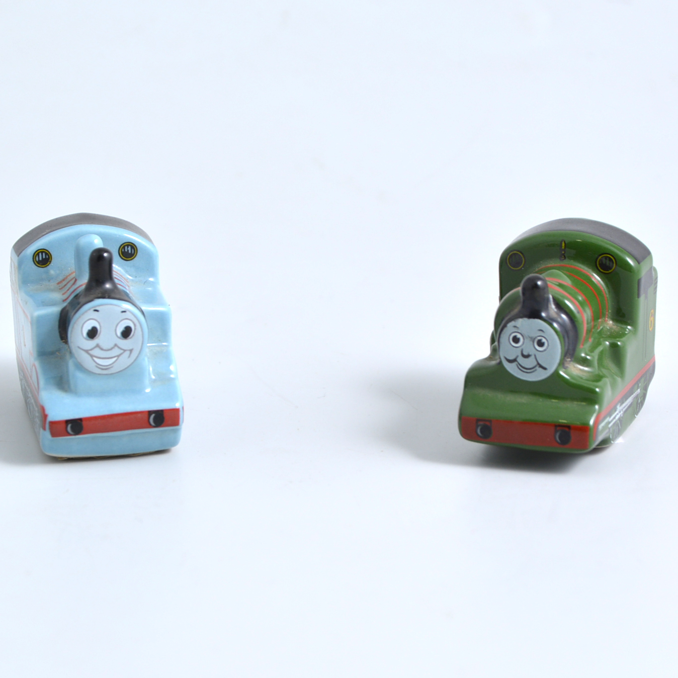 Pair of Wade models Thomas the Tank Engine and Percy, length 4cm.