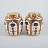 A pair of Royal Crown Derby ginger jars, Imari pattern number 1128, 19cm high.