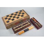 Folding Backgammon set, together with a Cribbage Board, together with a Travelling Chess set.