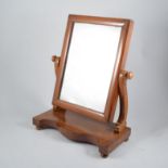 Victorian mahogany toilet mirror, rectangular plate, serpentine platform,