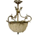 Gilt metal ornamental ceiling lamp with crystal-cut droplets.