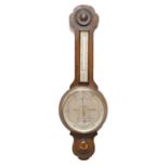 Oak carved wall barometer, height 78cm.