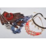 A box of modern costume jewellery, bead necklaces,