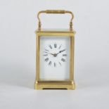 French brass cased carriage clock, white enamelled dial, platform escapement striking on a gong,