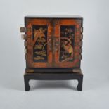 Japanese miniature cabinet on a stand, width 25cm, depth 15cm, height 32cm.