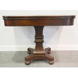 William IV mahogany fold-over tea table, raised on waisted column on shaped base,