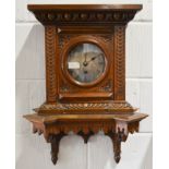 Victorian carved oak bracket clock, silvered dial with Roman numerals, single fusee movement,