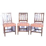 Set of six late Georgian Fruitwood Estate made chairs, each with a rectangular back,