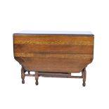 Oak gateleg dining table, shaped leaves, barley twist legs,