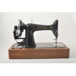 Singer sewing machine, oak case and another (no key).