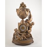 Louis XV style gilt painted spelter mantel clock, covered urn surmount modelled with cherubs,