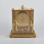 A Schatz anniversary clock in square gilded case 20cm high,