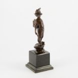 After Paul Ludwig Kowalczewski Boy with satchel and stick brown patinated bronze figure on a