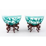 Near pair of green overlay Peking bowls, bearing incised four character marks,