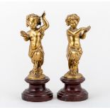 After Claude-Michel Clodion Child Satyrs a pair of gilt bronze figures on marble plinths 25cm (2).