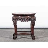 Chinese hardwood stand, shaped circular top with variegated marble inset, beaded edge,