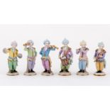 Set of six Sitzendorf porcelain models, Turkish bandsmen, 20th Century, each with an instrument,