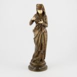 Albert Ernst Carrier-Belleuse La Liseuse gilt bronze and carved ivory figure, integral socle 42cm.