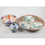 Collection of Japanese Imari plates and dishes, decorated in the traditional palette, various sizes,