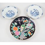 Chinese famille noir charger, decorated with Asiatic Pheasant amongst flowering foliage,