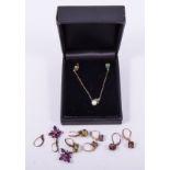Four pairs of coloured gemstone earrings, to include spessartite garnet, amethyst etc,