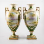 Pair of tall Noritake vases, panels decorated with river landscapes, one damaged, 43cm.