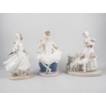 Lladro group of a girl with goats, 28cm; four other Lladro figures,