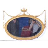 Edwardian wall mirror, Neo Classical style with an urn finial, bell flower swags,