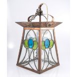 Edwardian copper lantern, leaded and stained glass panels, 46cm overall.