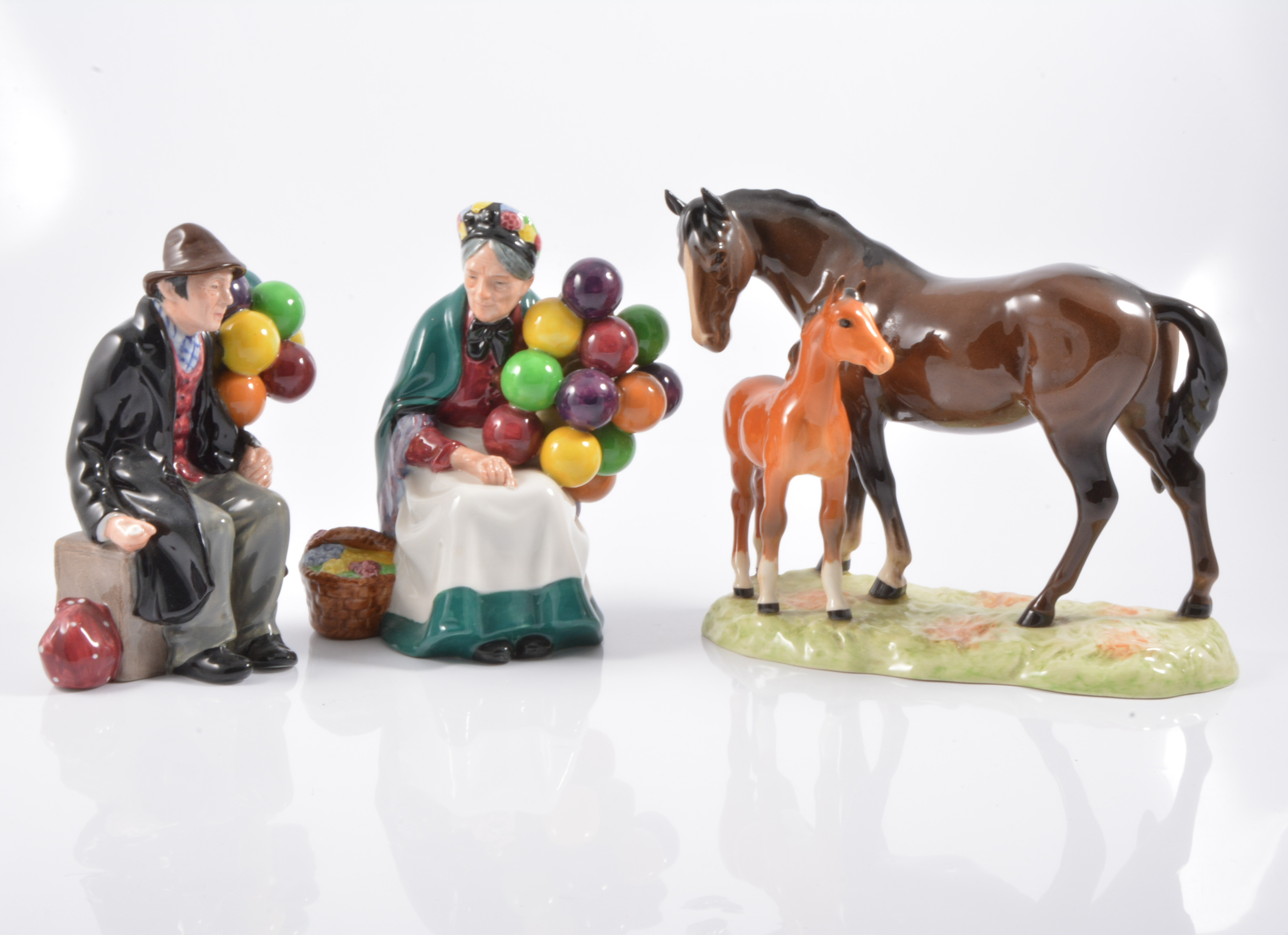 Royal Doulton figures, Balloon Man; Balloon Lady; horse and foal, and Coalport lady,