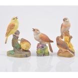 Collection of Royal Worcester bird models, including Yellow Hammer, Linnets, Stonechat, Greenfinch,