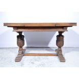 Oak draw-leaf dining table, twin bulbous supports, stretcher base, overall length 205cm, width 81cm.