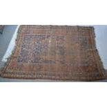 Old Persian rug, field with boteh motifs on a blue ground, multi-bordered, badly worn,