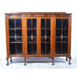 Mahogany china cabinet by Maple & Co.