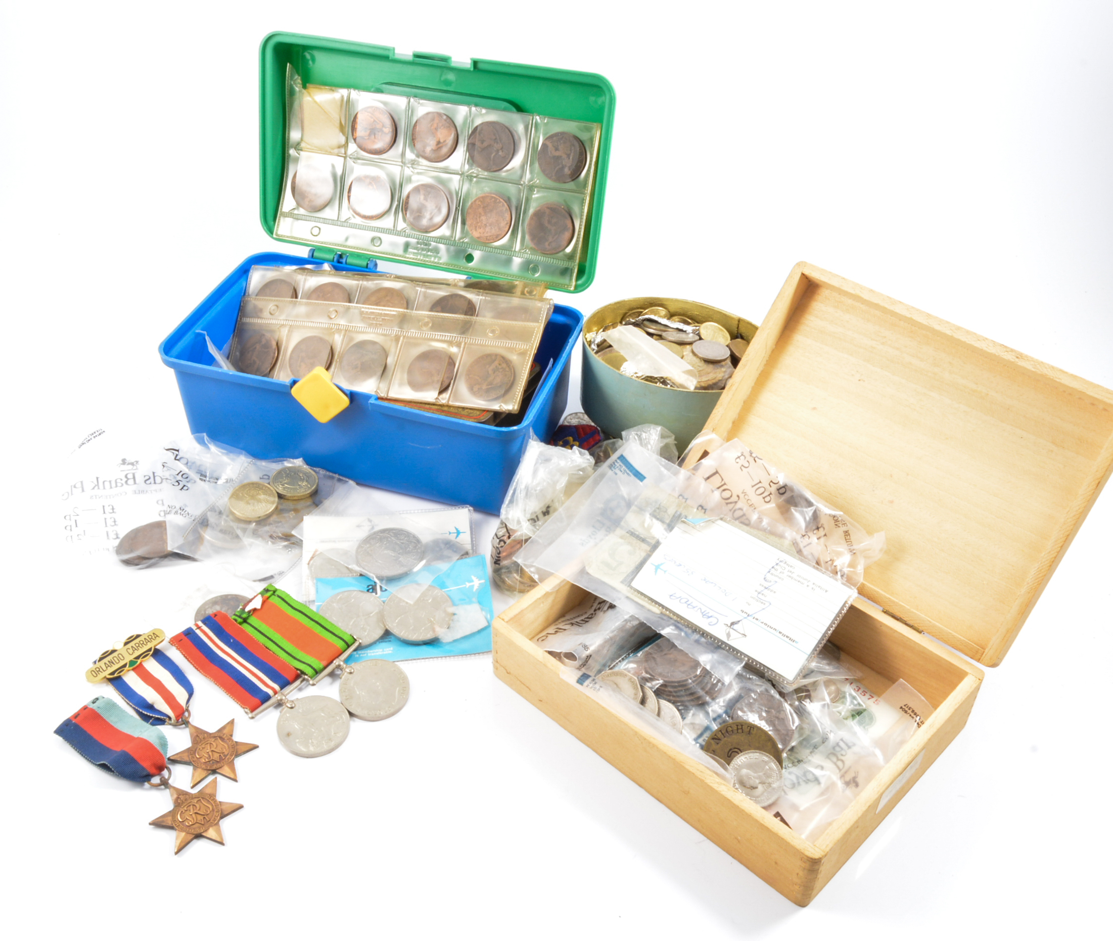 Box of coins and war medals.