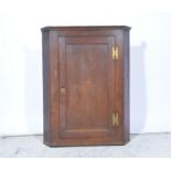 Victorian oak hanging oak corner cupboard, panelled door, no key, locked, height 99cm.