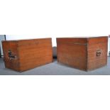 Two large rectangular teak trunks, with hinged lids, width 87cm, depth 56cm, height 55cm.