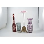 A ruby cased glass decanter, 38cm, an amethyst cased glass vase 28cm,