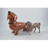 Beswick fireside model of a Dachshund, 29cm and a Beswick chestnut coloured model of a horse, (2).