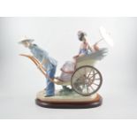 Lladro group with a rickshaw, No.1383, with plinth, height 34cm.