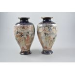 Pair of Satsuma ovoid vases, reserves painted with figures,