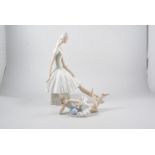 A large Nao porcelain model of a seated ballerina, 35cm and another Nao model of a ballerina, (2).