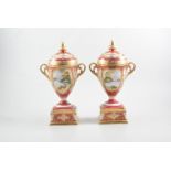 Pair of Japanese Noritake urn-shape vases with domed covers, square plinth,