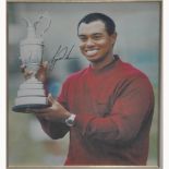 Golf Interest: Signed photograph of Tiger Woods.