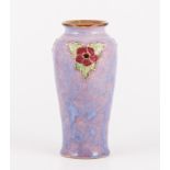 Doulton Lambeth, a stoneware vase, tubelined with floral motifs to the shoulder,