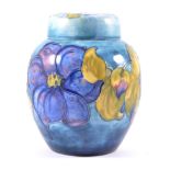 Walter Moorcroft, Clematis, a ginger jar and cover, circa 1965, smokey ground, initialled in blue,