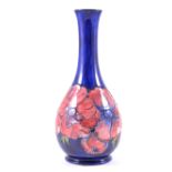 Walter Moorcroft, Anemone, a limited edition bottle vase, numbered 66/200, dated 1982, 26cm.
