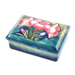 William Moorcroft, Freesia, a rectangular pin dish and cover, circa 1935, facsimile signature stamp,